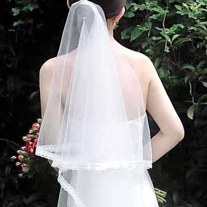 Wedding veil - lace trimmed with comb